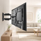 Support mural TV articulé Norden Motion Compact dans un salon